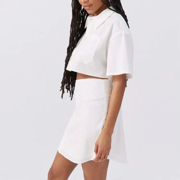 Two piece set women short sleeve shirt with tab collar paired with a mini skirt cotton material